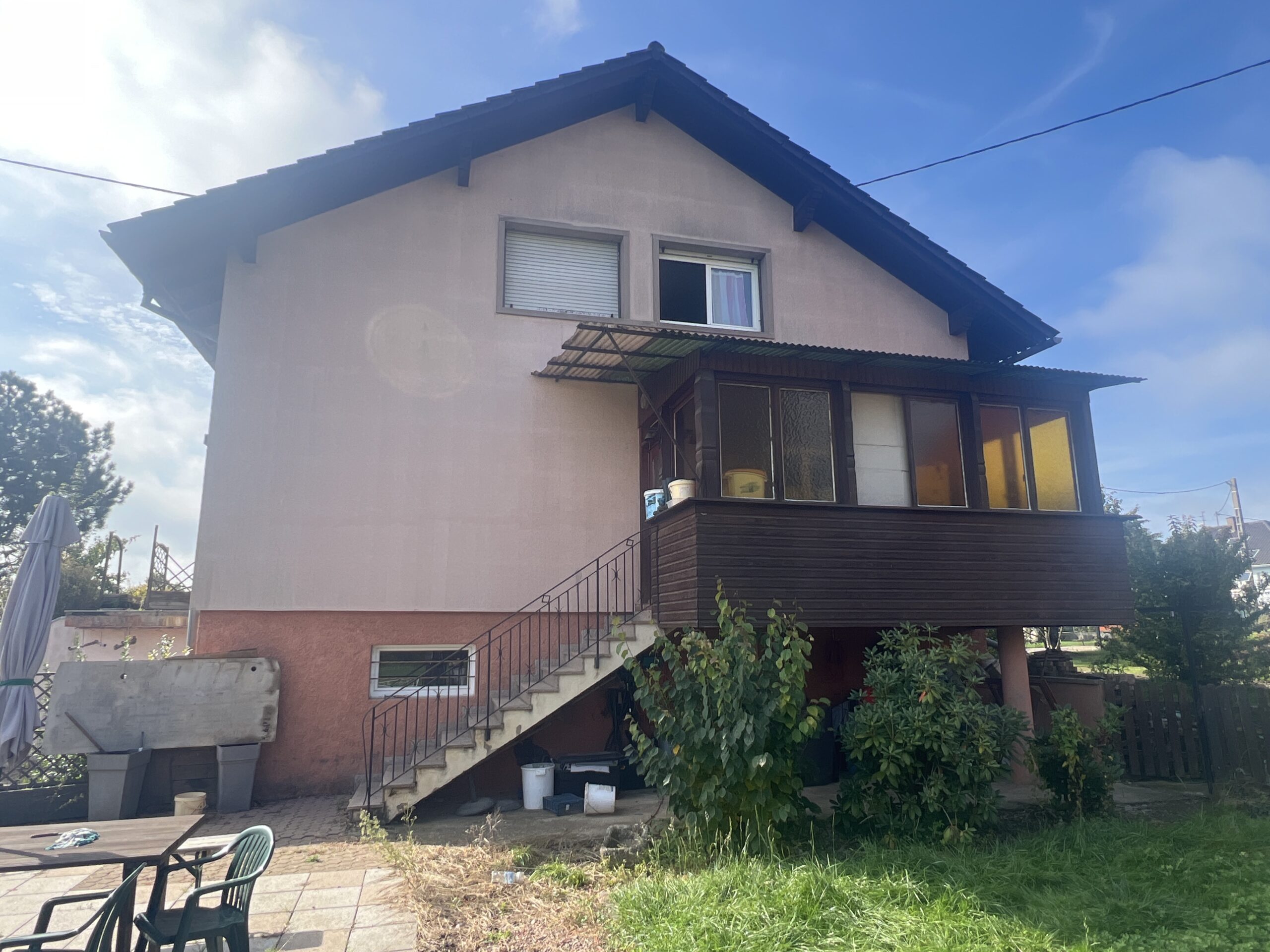 isolation extérieure à Bernolsheim – côté véranda avant travaux isolation extérieure à Bernolsheim : façade côté véranda avant travaux